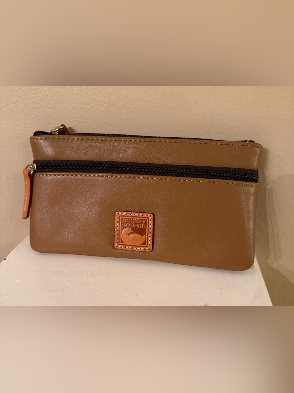 Dooney & Bourke double-zip leather pouch/wristlet EUC